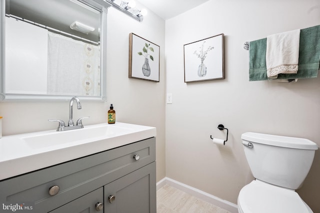 2074 Royal Fern Ct Unit 1C, Reston, VA 20191 - bathroom featuring toilet and vanity