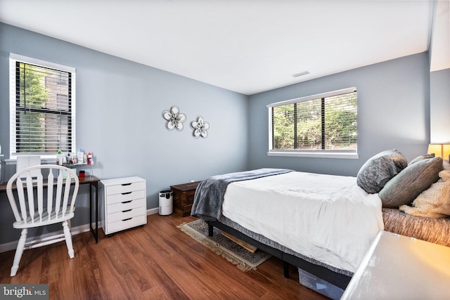 2074 Royal Fern Ct Unit 1C, Reston, VA 20191 - bedroom with wood finished floors and baseboards