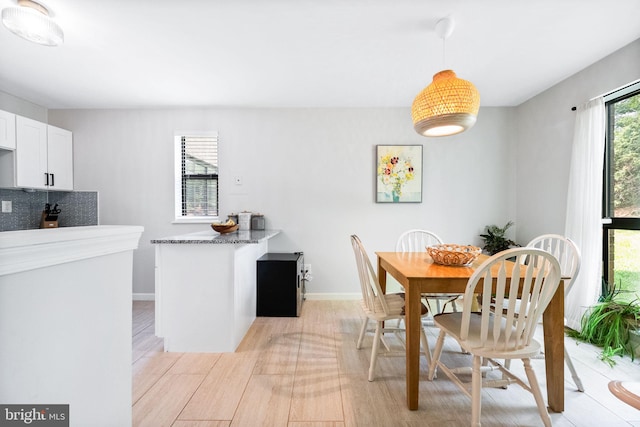 2074 Royal Fern Ct Unit 1C, Reston, VA 20191 - dining space with light wood finished floors and baseboards