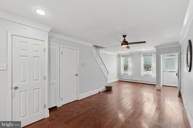 3121 Edgemont St, Philadelphia, PA 19134 - unfurnished living room with a baseboard radiator, a ceiling fan, crown molding, stairway, and wood finished floors