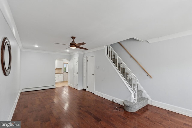 3121 Edgemont St, Philadelphia, PA 19134 - unfurnished living room with a baseboard heating unit, arched walkways, hardwood / wood-style flooring, ceiling fan, and stairs