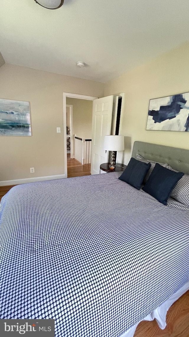 4420 Brandywine St NW, Washington, DC 20016 - bedroom featuring baseboards and wood finished floors