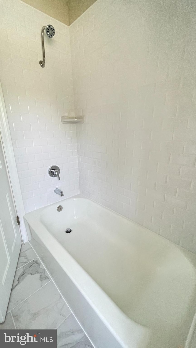 4420 Brandywine St NW, Washington, DC 20016 - bathroom featuring marble finish floors and tub / shower combination