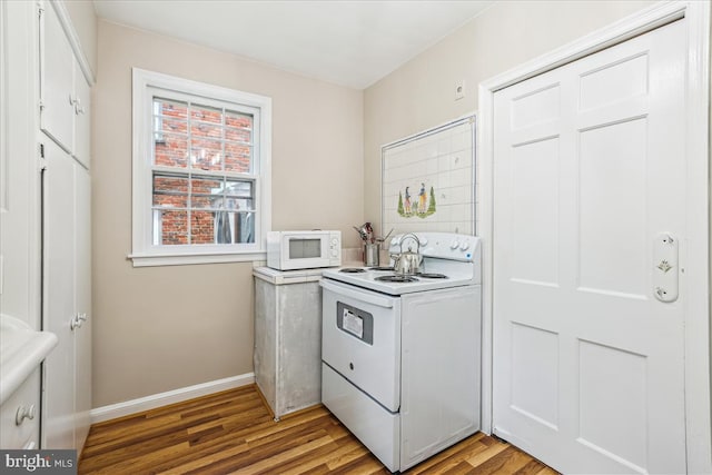 4420 Brandywine St NW, Washington, DC 20016 - laundry area featuring light wood-style floors