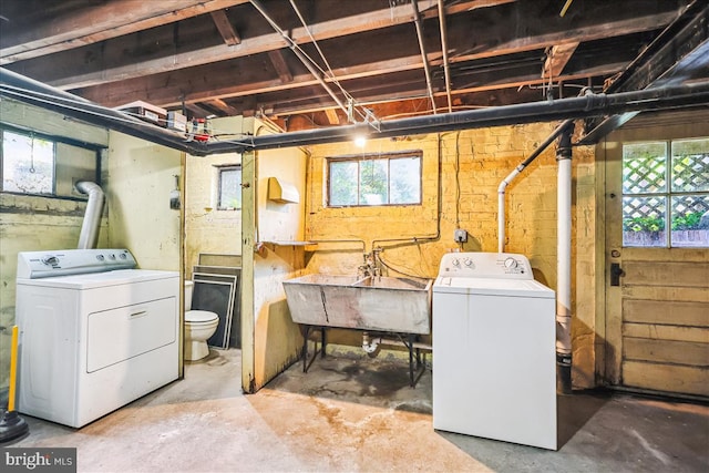 4420 Brandywine St NW, Washington, DC 20016 - basement with a sink and washer and dryer