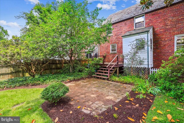 4420 Brandywine St NW, Washington, DC 20016 - fenced backyard with a patio and a wooden deck
