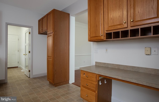 2125 Chatham Way, Harrisburg, PA 17110 - kitchen featuring open shelves, brown cabinets, and light countertops
