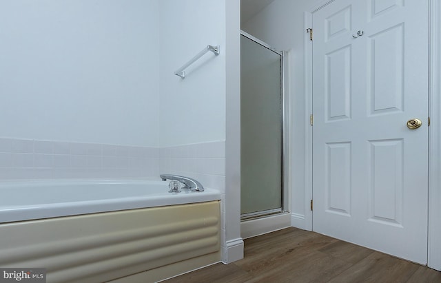 2125 Chatham Way, Harrisburg, PA 17110 - full bath with a garden tub, a stall shower, and wood finished floors