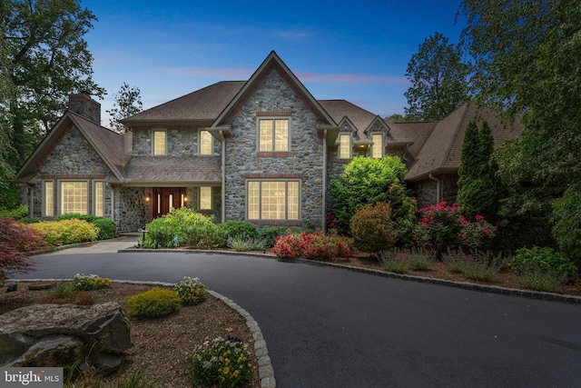 650 S Warren Ave, Malvern, PA 19355 - view of front of property with stone siding and a chimney