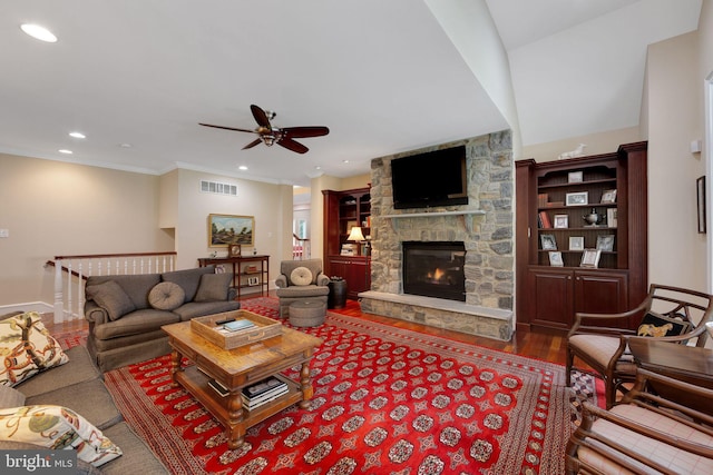 650 S Warren Ave, Malvern, PA 19355 - living area with a ceiling fan, wood finished floors, a fireplace, recessed lighting, and ornamental molding