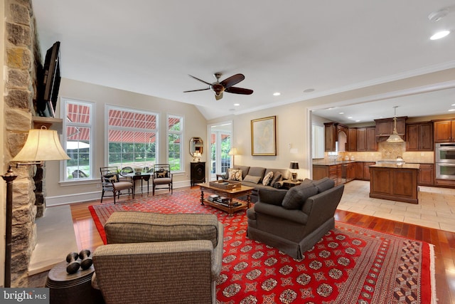 650 S Warren Ave, Malvern, PA 19355 - living room with light wood-type flooring, ceiling fan, crown molding, and recessed lighting