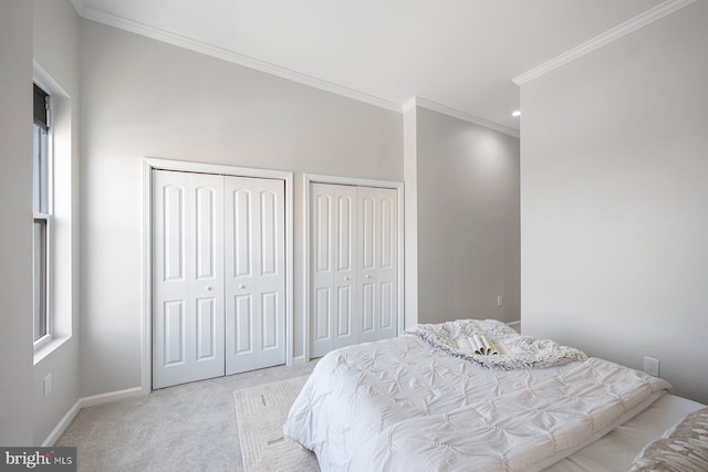 19 N Smallwood St, Baltimore, MD 21223 - carpeted bedroom featuring multiple closets, crown molding, and recessed lighting