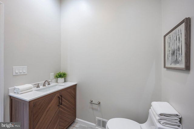 19 N Smallwood St, Baltimore, MD 21223 - bathroom featuring toilet and vanity