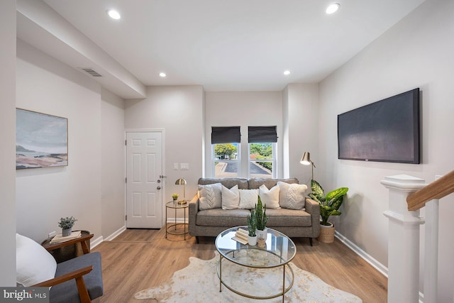 19 N Smallwood St, Baltimore, MD 21223 - living area with recessed lighting and light wood finished floors