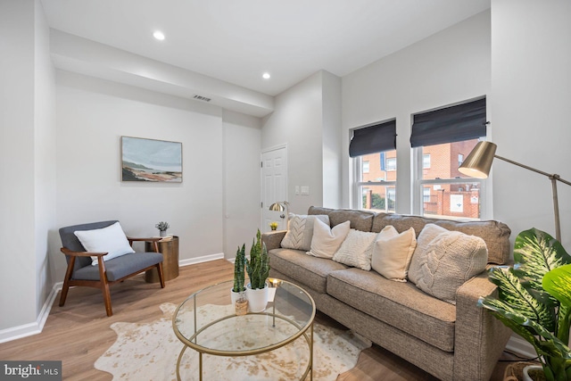 19 N Smallwood St, Baltimore, MD 21223 - living area featuring light wood-style flooring and recessed lighting