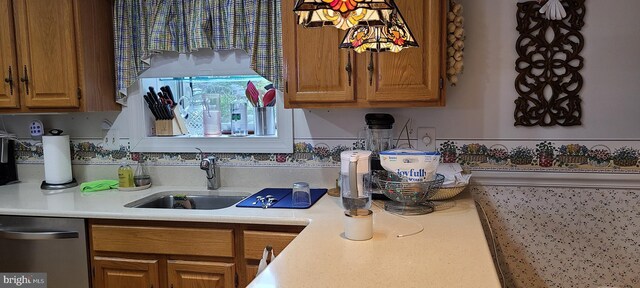 13209 Marthas Choice Cir, Bowie, MD 20720 - kitchen featuring dishwasher, light countertops, and brown cabinets