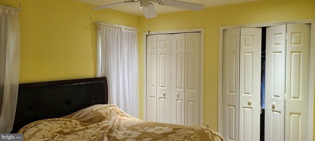 13209 Marthas Choice Cir, Bowie, MD 20720 - bedroom with two closets and a ceiling fan