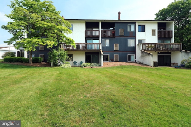 804 Stratford Dr Unit 11, State College, PA 16801 - rear view of house with a balcony and a yard