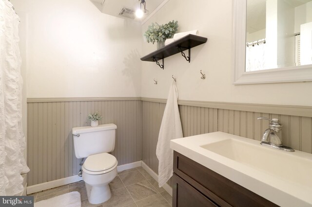 804 Stratford Dr Unit 11, State College, PA 16801 - full bath featuring vanity, a wainscoted wall, and tile patterned floors