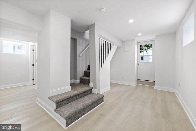 8247 River Rd, Pennsauken, NJ 08110 - foyer entrance with light wood-style flooring, stairs, and recessed lighting