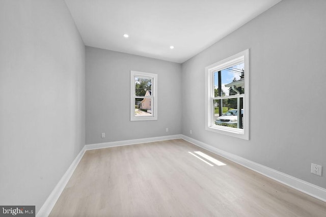 8247 River Rd, Pennsauken, NJ 08110 - spare room with healthy amount of natural light, light wood-type flooring, and recessed lighting