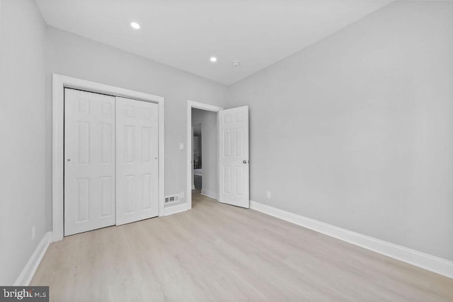 8247 River Rd, Pennsauken, NJ 08110 - unfurnished bedroom featuring light wood-type flooring, a closet, and recessed lighting