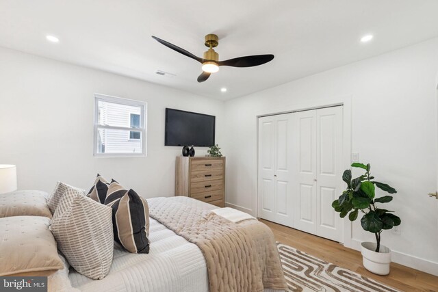 1232 S Bucknell St, Philadelphia, PA 19146 - bedroom with light wood-type flooring, a closet, recessed lighting, and ceiling fan