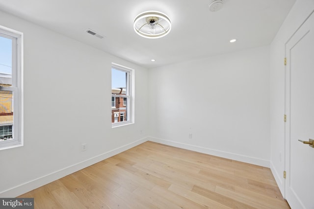 1232 S Bucknell St, Philadelphia, PA 19146 - unfurnished room with a smoke detector, light wood finished floors, and recessed lighting