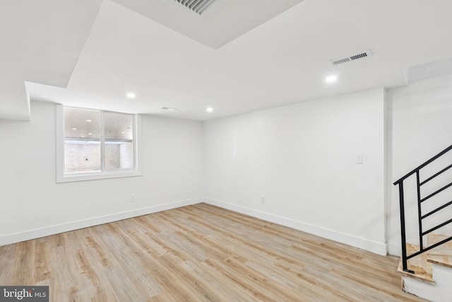 1232 S Bucknell St, Philadelphia, PA 19146 - spare room with wood finished floors, stairs, and recessed lighting