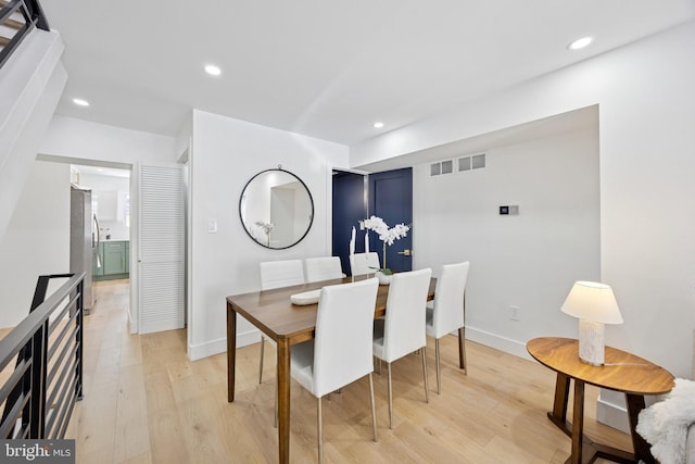 1232 S Bucknell St, Philadelphia, PA 19146 - dining room with light wood finished floors and recessed lighting