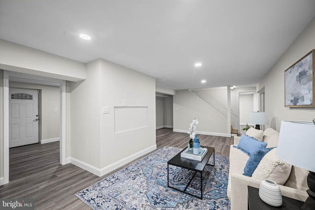 9017 Marcella Ave, Randallstown, MD 21133 - living area featuring recessed lighting, wood finished floors, and stairs