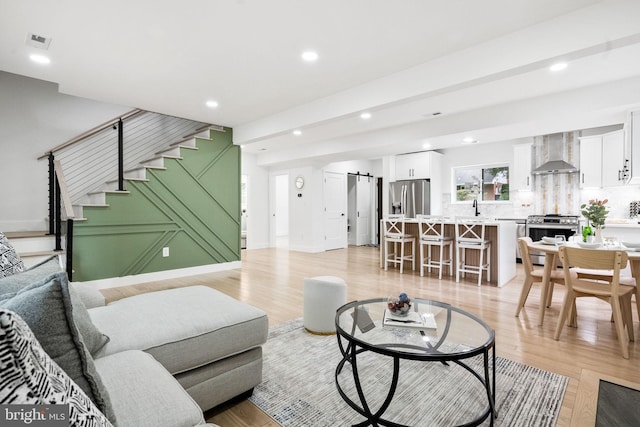 7214 16th Ave, Takoma Park, MD 20912 - living area featuring stairs, light wood-type flooring, and recessed lighting