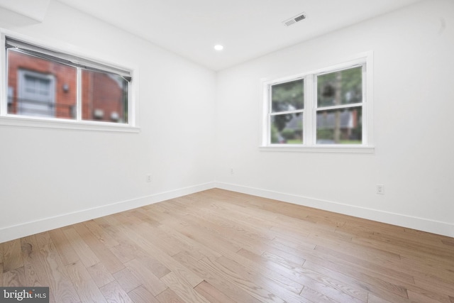 7214 16th Ave, Takoma Park, MD 20912 - empty room with wood finished floors and recessed lighting