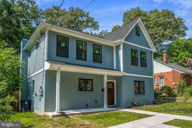 7214 16th Ave, Takoma Park, MD 20912 - view of front of property featuring brick siding and a chimney