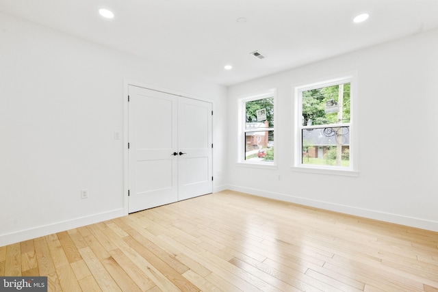 7214 16th Ave, Takoma Park, MD 20912 - unfurnished bedroom featuring wood finished floors, recessed lighting, and a closet