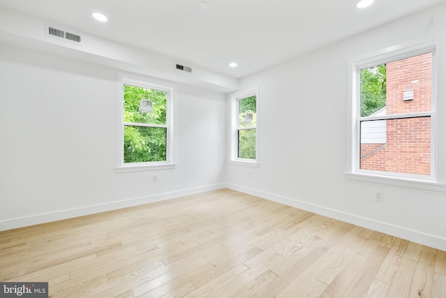 7214 16th Ave, Takoma Park, MD 20912 - empty room with light wood finished floors and recessed lighting
