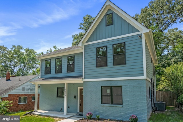 7214 16th Ave, Takoma Park, MD 20912 - view of front of house with brick siding, board and batten siding, and covered porch