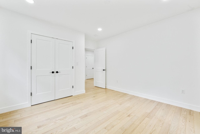 7214 16th Ave, Takoma Park, MD 20912 - unfurnished bedroom with wood finished floors, recessed lighting, and a closet