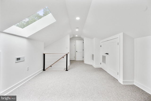 7214 16th Ave, Takoma Park, MD 20912 - additional living space featuring a skylight, vaulted ceiling, carpet flooring, and recessed lighting