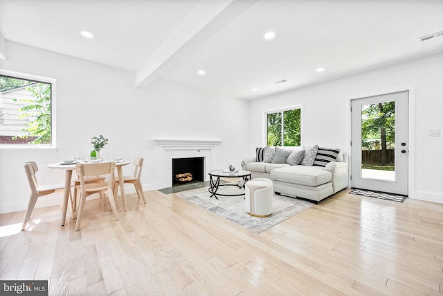 7214 16th Ave, Takoma Park, MD 20912 - living area featuring light wood-type flooring, beam ceiling, a fireplace, and recessed lighting