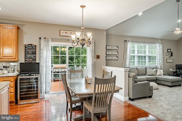 15 Boraten Cir, Royersford, PA 19468 - dining space with wine cooler, light wood finished floors, a chandelier, and a ceiling fan