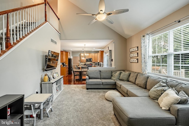 15 Boraten Cir, Royersford, PA 19468 - living area featuring a chandelier, a ceiling fan, vaulted ceiling, and light carpet