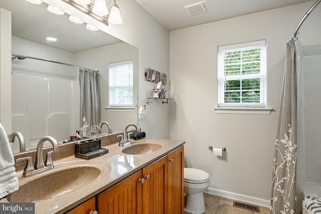 15 Boraten Cir, Royersford, PA 19468 - bathroom featuring double vanity, tile patterned flooring, and a shower with curtain
