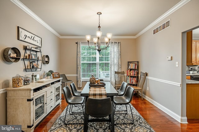 15 Boraten Cir, Royersford, PA 19468 - dining area with dark wood finished floors, a chandelier, and ornamental molding