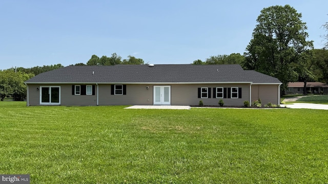 104 Lake Front Dr, Dover, DE 19904 - back of house featuring french doors and a lawn