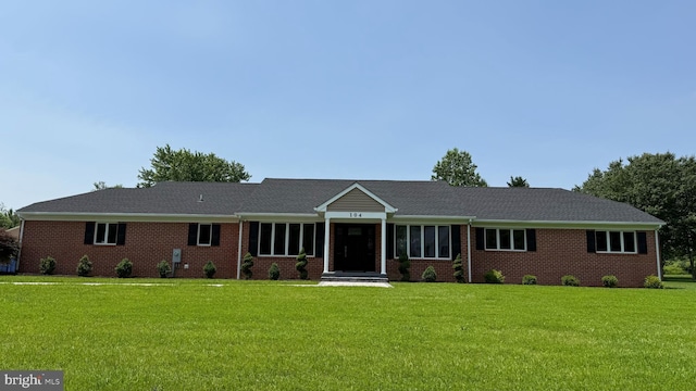 104 Lake Front Dr, Dover, DE 19904 - ranch-style house with a front lawn and brick siding