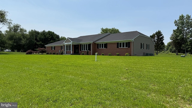 104 Lake Front Dr, Dover, DE 19904 - ranch-style home featuring a front lawn and brick siding