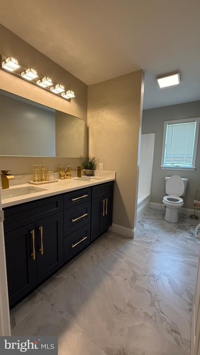 104 Lake Front Dr, Dover, DE 19904 - bathroom with marble look tile flooring and vanity