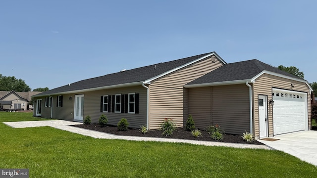 104 Lake Front Dr, Dover, DE 19904 - ranch-style house featuring a garage, a front lawn, driveway, and roof with shingles