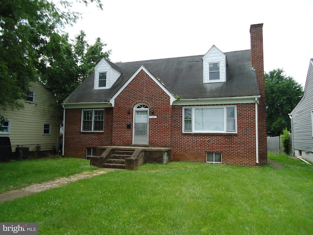 1501 Dixon St, Fredericksburg, VA 22401 - view of front of house with brick siding, a chimney, and a shingled roof